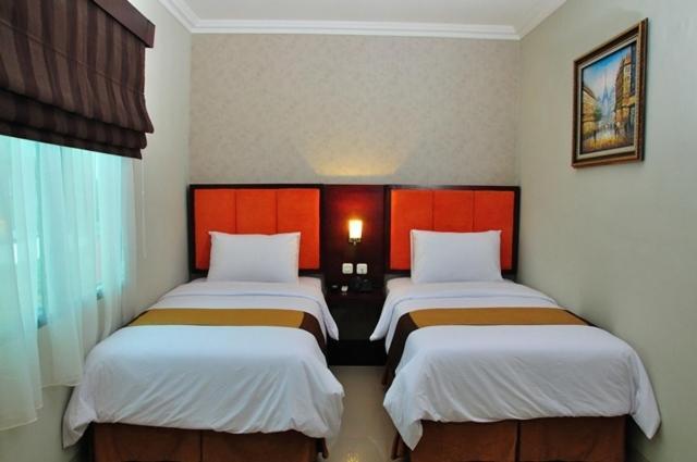 Feodora Airport Hotel Палембанг Стая снимка